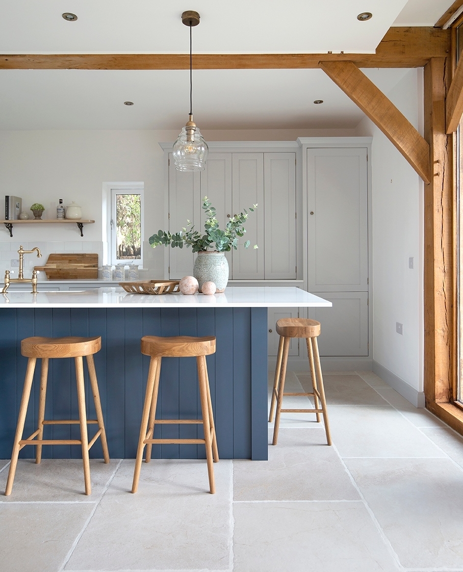 Modern kitchen interior with stone flooring. Photo by Instagram user @mystonefloor.
