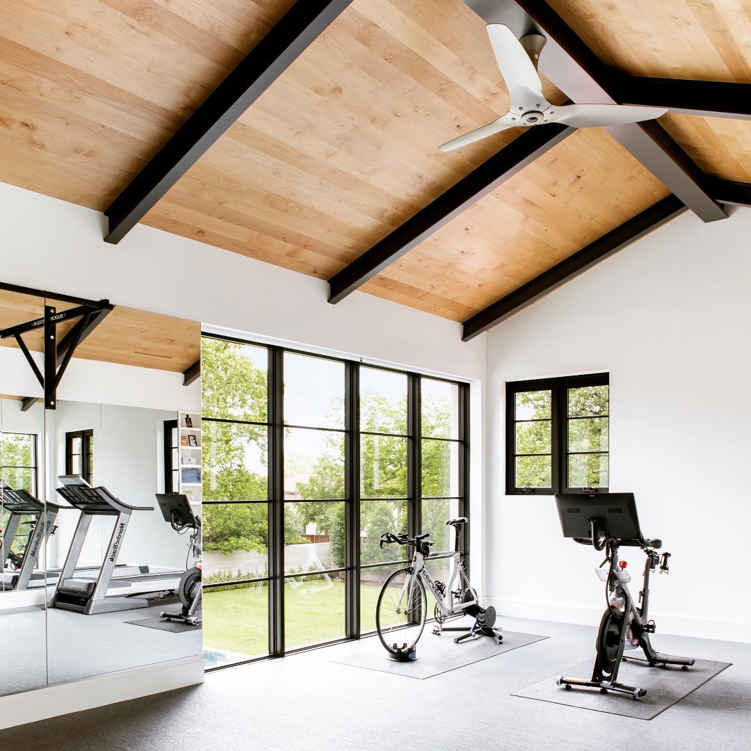 Luxury home gym with wood ceiling. Photo via Instagram user @foxr.gym