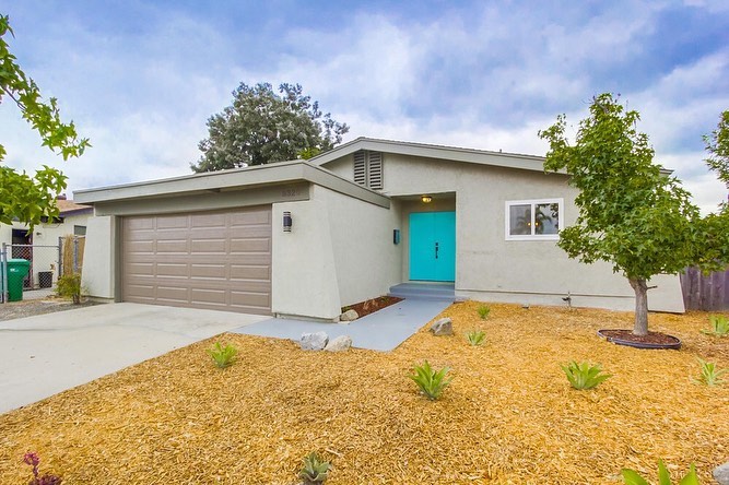 Gray ranch home with a blue door in Santee, California
