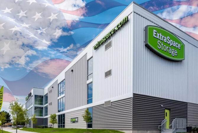 Extra Space Storage facility exterior with American flag background in sky