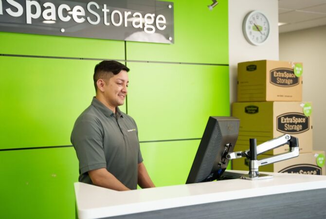 Extra Space Storage facility staff member behind desk