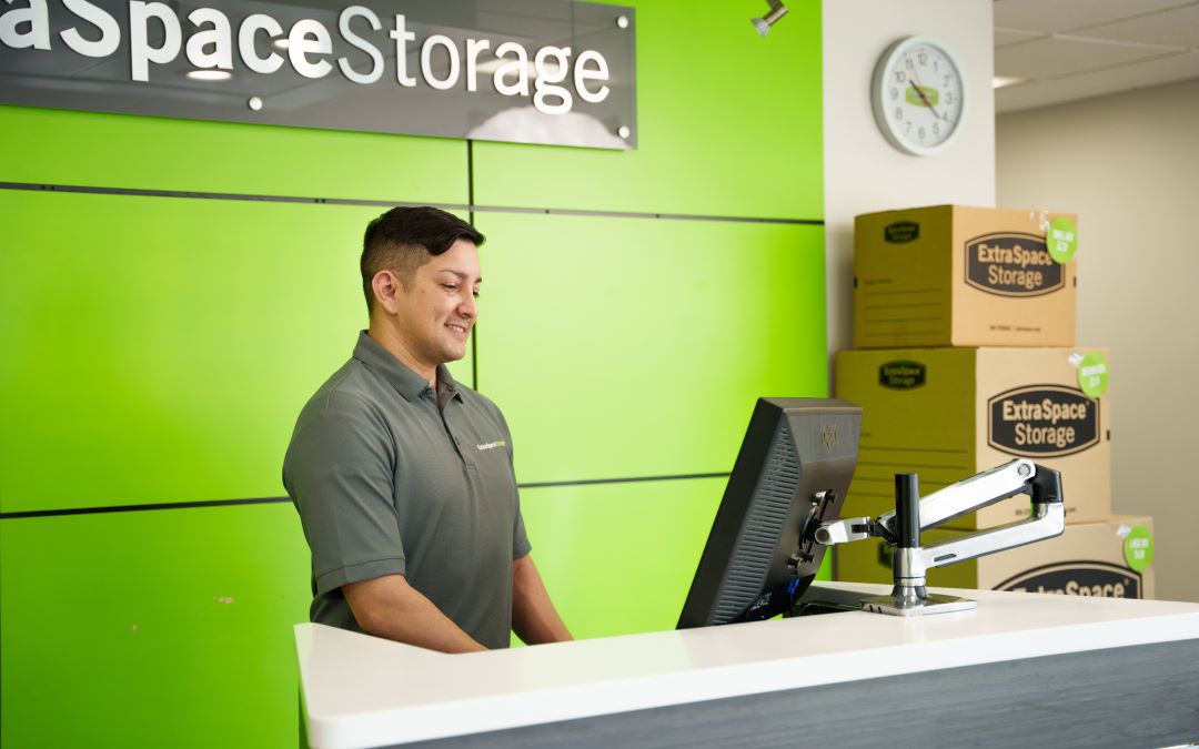 Extra Space Storage facility staff member behind desk