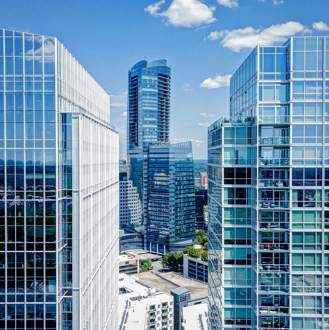 Glass skyscrapers in Buckhead Atlanta for office employees. Photo by Instagram user @wanderdrone.