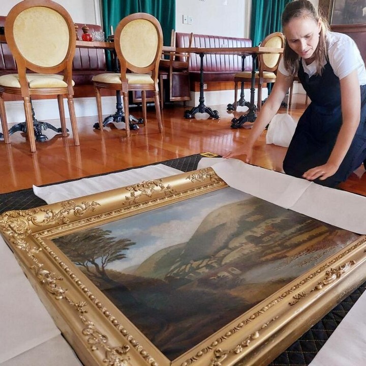 woman packing painting. photo via @your_easy_move