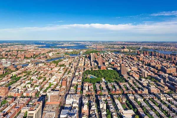 Aerial view of Bronx neighborhood grid with rivers and parks throughout