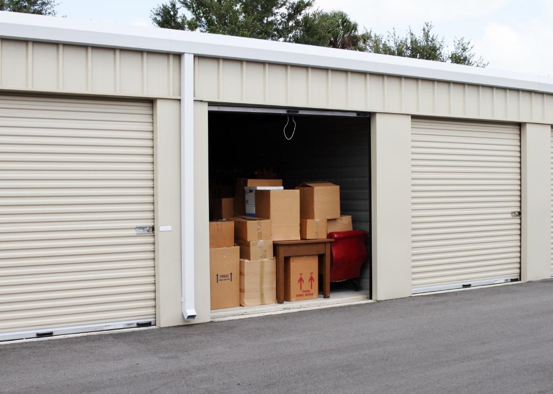 Open storage unit filled with boxes at outdoor storage facility