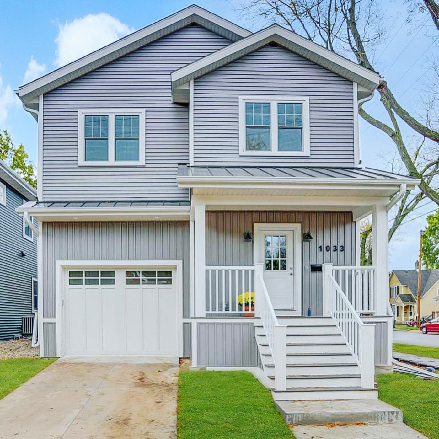Two-story light gray home in Vilas, Madison. Photo by Instagram username @lynnholleyrealestate