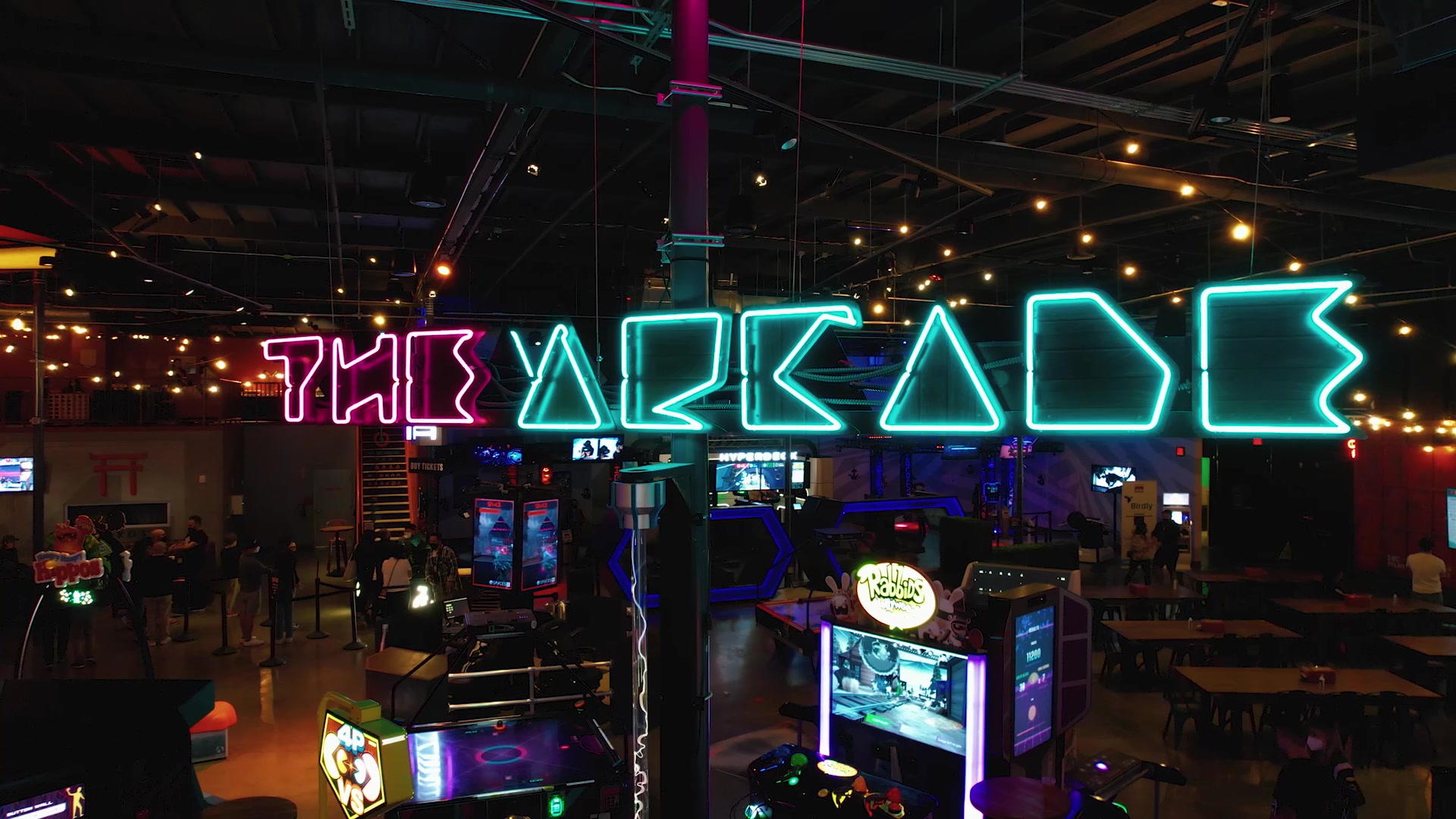 Neon "The Arkade" sign from Extra Space Storage's Local Places & Extraordinary Spaces video series