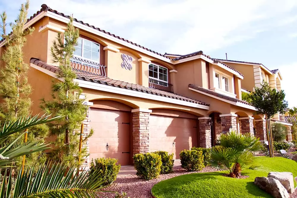 las vegas home with two car garage and landscaping