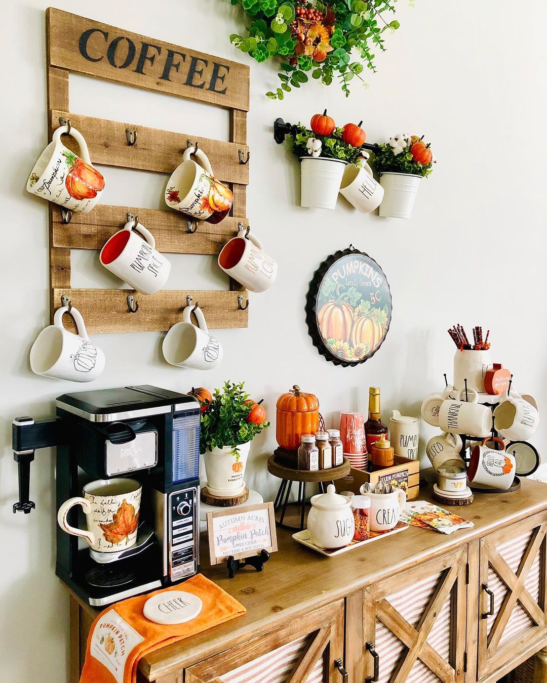 Photo of a coffee bar with autumnal accents. Photo via @carmensmakingthishouseahome.