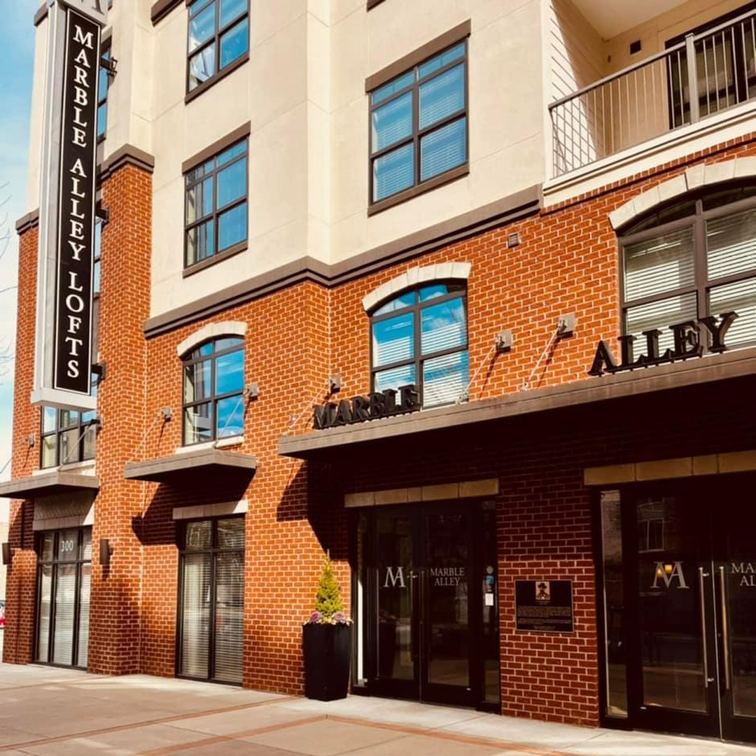 The stone and brick facade of Marble Alley Lofts in Downtown Knoxville. Photo from Instragram user @marblealleylofts.