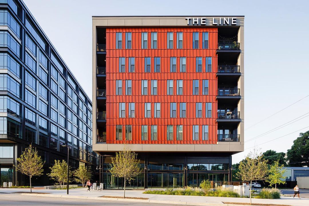 A view of the vibrant face and modern architecture of The Line Downtown Apartments in Raleigh. Photo by Instagram user @sterlphoto.