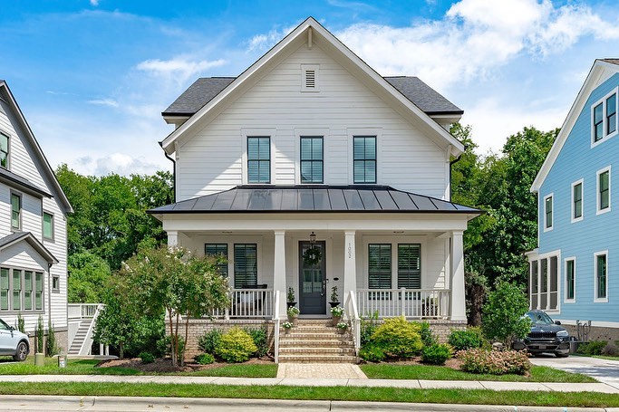 A home in Mordecai, Raleigh with a well-kept lawn. Photo by Instagram user @chappellres.