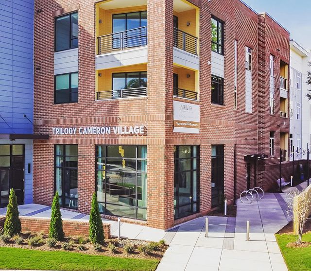 An angled view of The Edition on Berlin brick apartments in the Village District of Raleigh. Photo by Instagram user @editionoberlin.