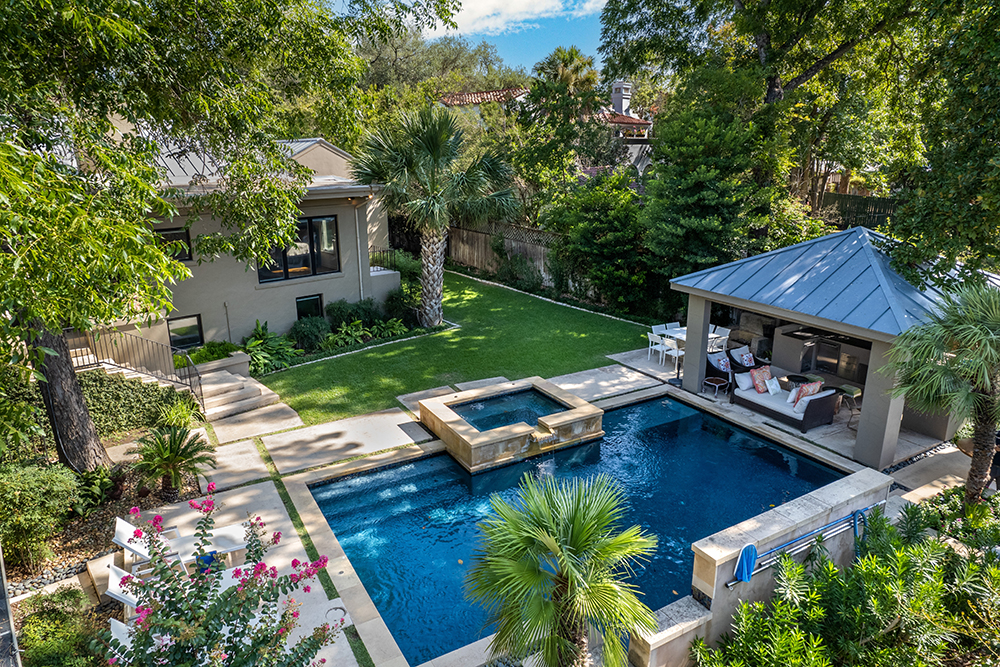 residential home backyard in Texas with swimming pool