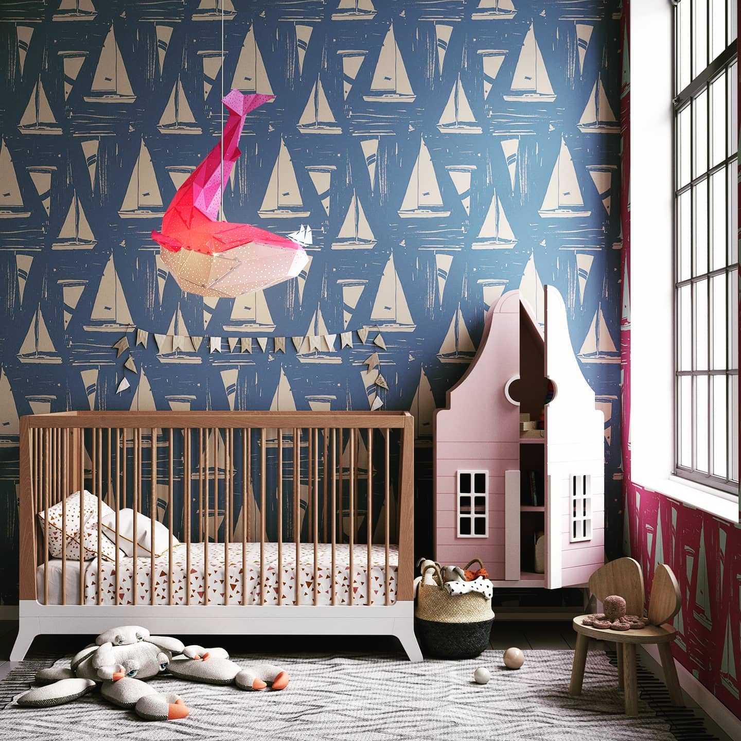 Sea themed baby room with sailboat wallpaper and whale lighting ficture. Photo by Instagram user @vasililights