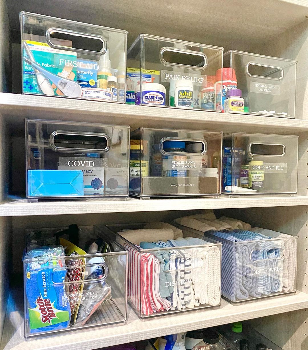Organized shelf with cleaning supplies, medical supplies, medicine, and more. Photo by Instagram user @luxeorganizingsolutions