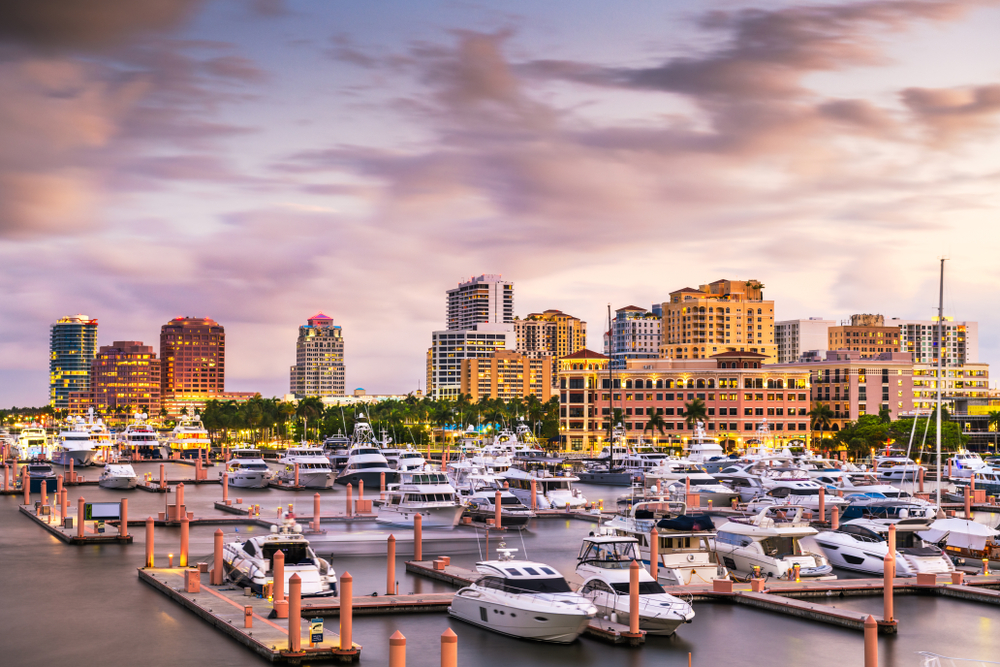 A skyline filled with buildings and boats in West Palm Beach.