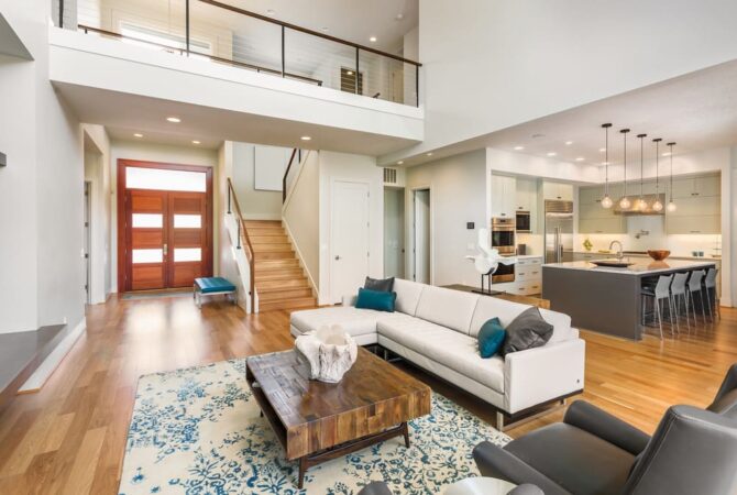 Organized living room with wooden floors in a modern home.
