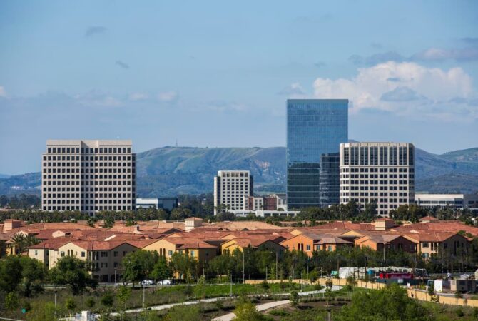 Skyline of Irvine California with mountains in the background