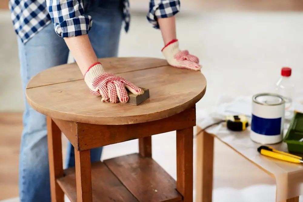 A craftsman working on a furniture restoration project