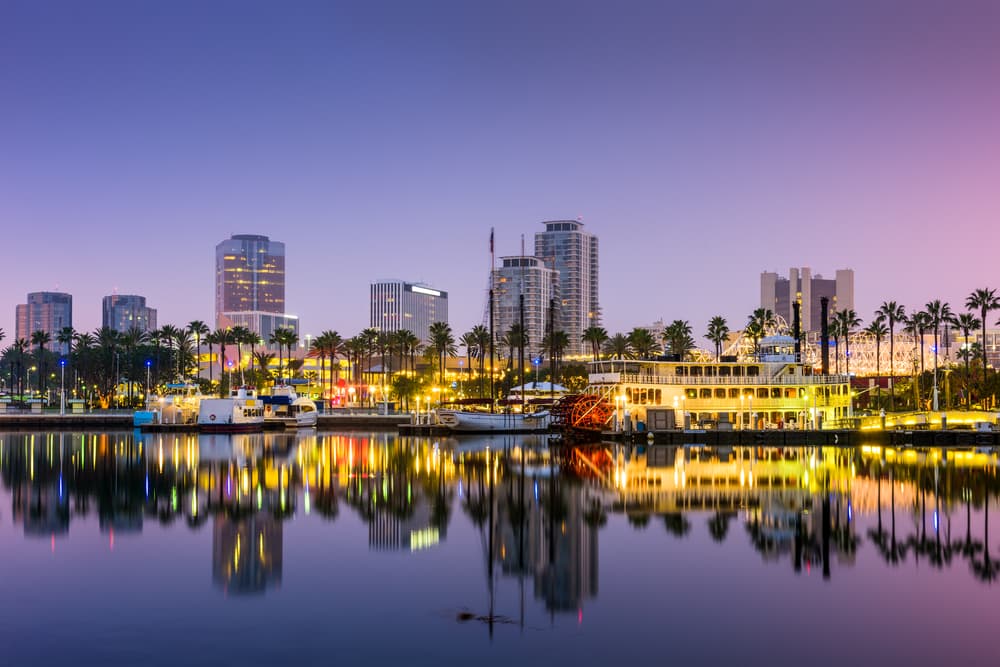 Skyline of Long Beach California in behind the ocean at night