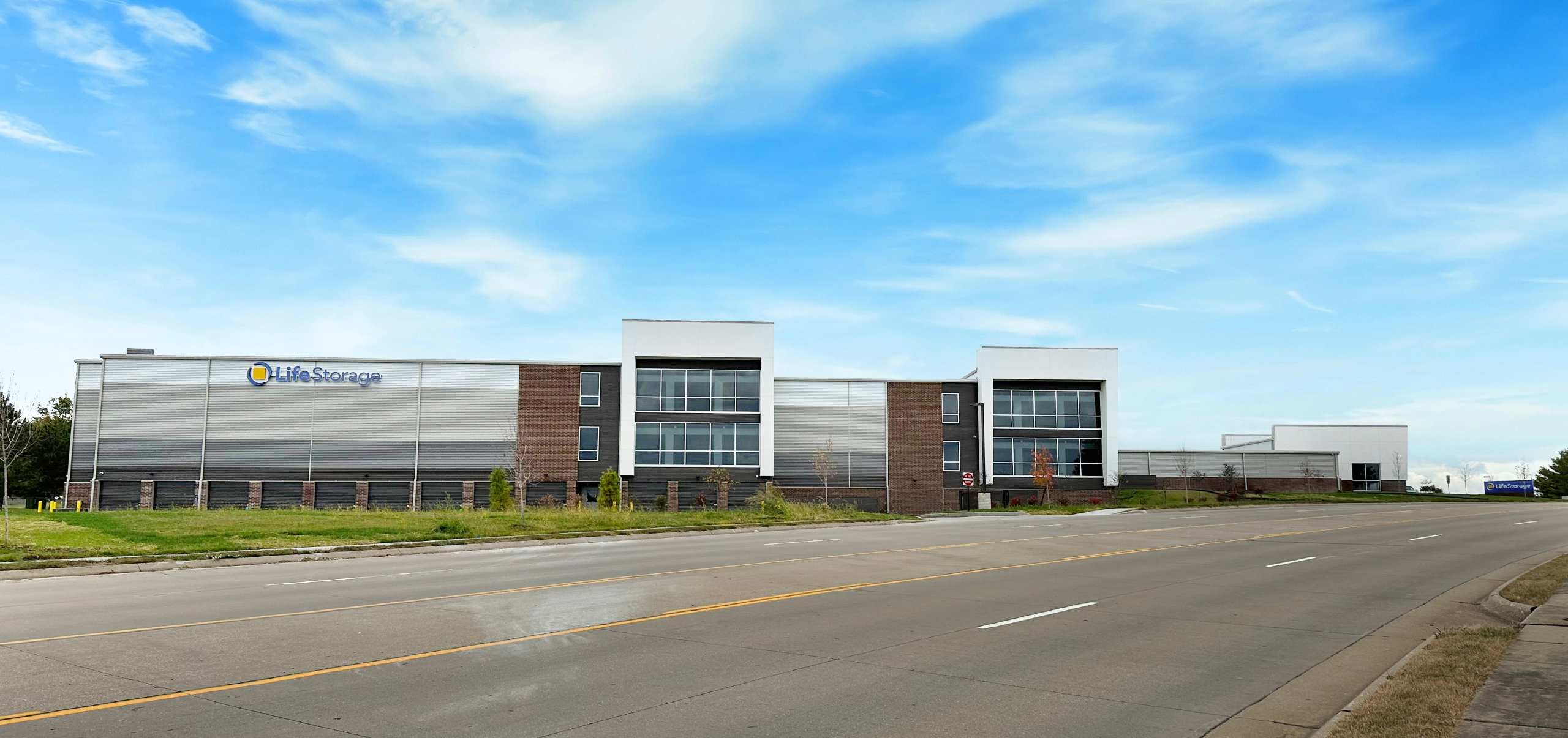 Wide exterior shot of the new St Peters, MO Life Storage storage facility at 1610 Woodstone Dr. 