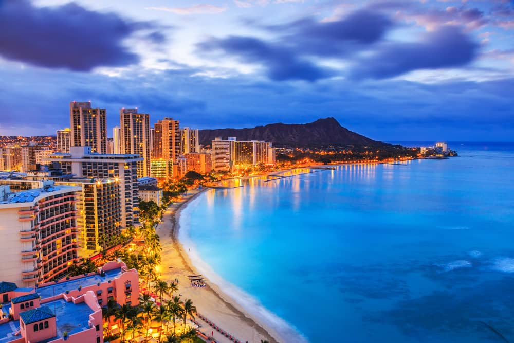 Aerial view of Honolulu, HI oceanfront skyline.