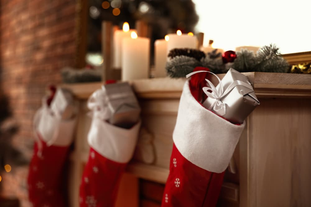 A festive Christmas mantel with stockings.