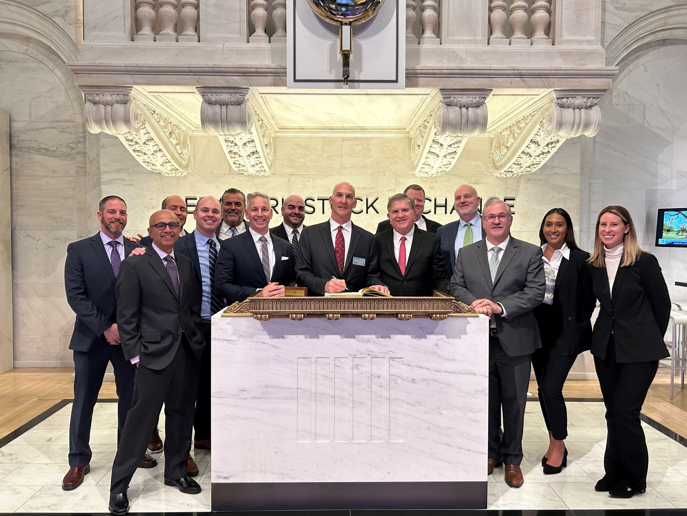 Extra Space Storage CEO Joe Margolis and founder Ken Woolley at the New York Stock Exchange closing bell ceremony. 