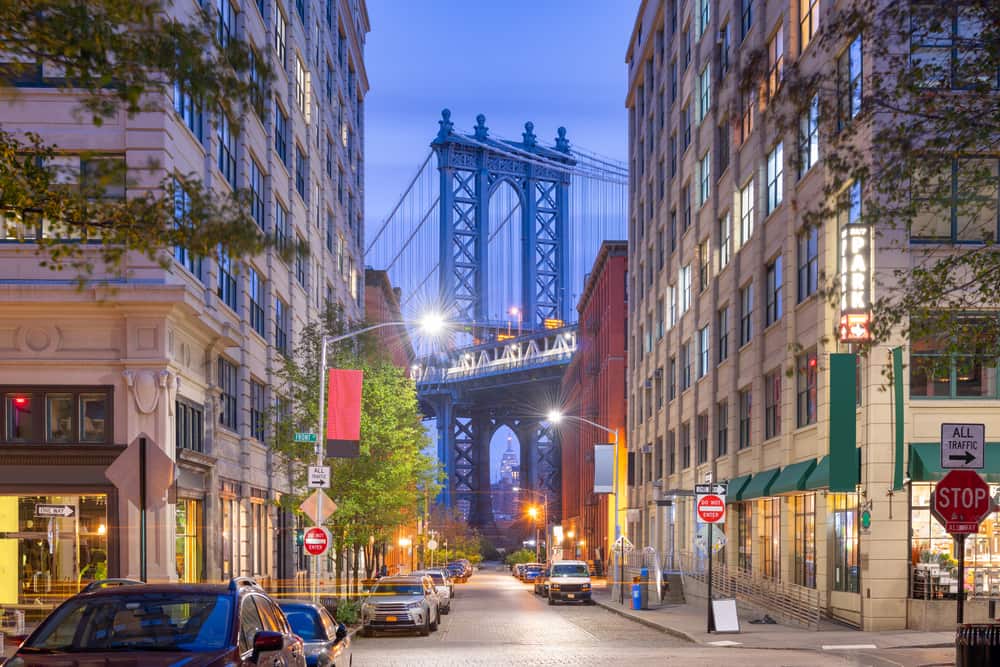 A view of the Brooklyn Bridge from the street in New York City.