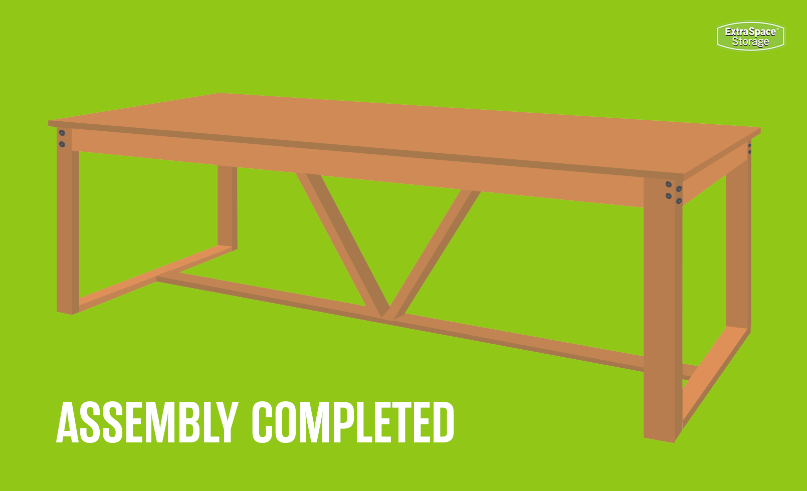 Illustration of a completed wooden table on a green background. The table features a sturdy rectangular frame with a V-shaped support in the center and visible screws at the joints. White text at the bottom reads 'ASSEMBLY COMPLETED