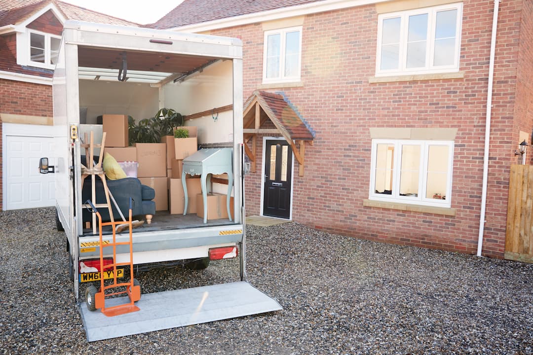 house with moving truck