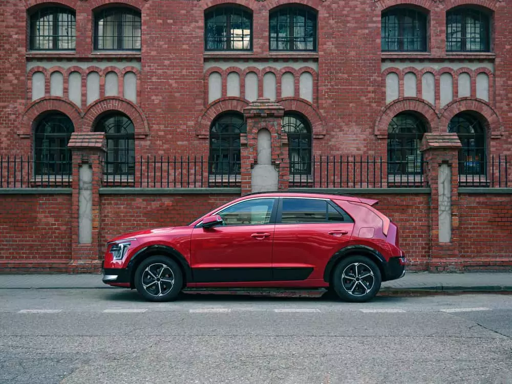 Red SUV parked on the street.
