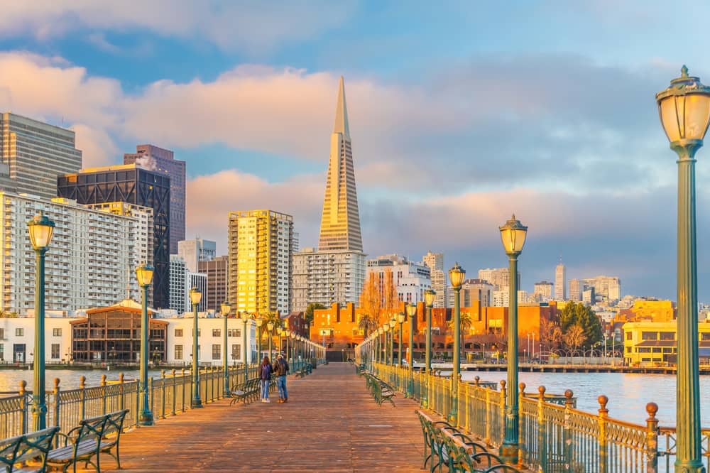 Skyline image of San Francisco from a boardwalk.