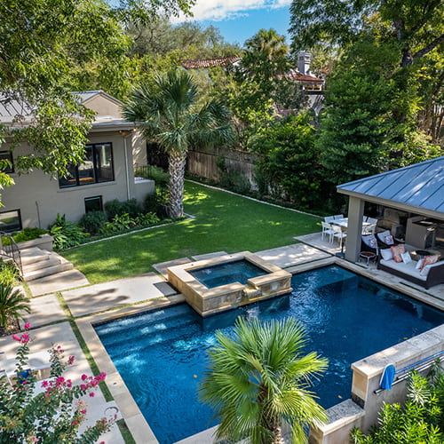 residential home backyard in Texas with swimming pool